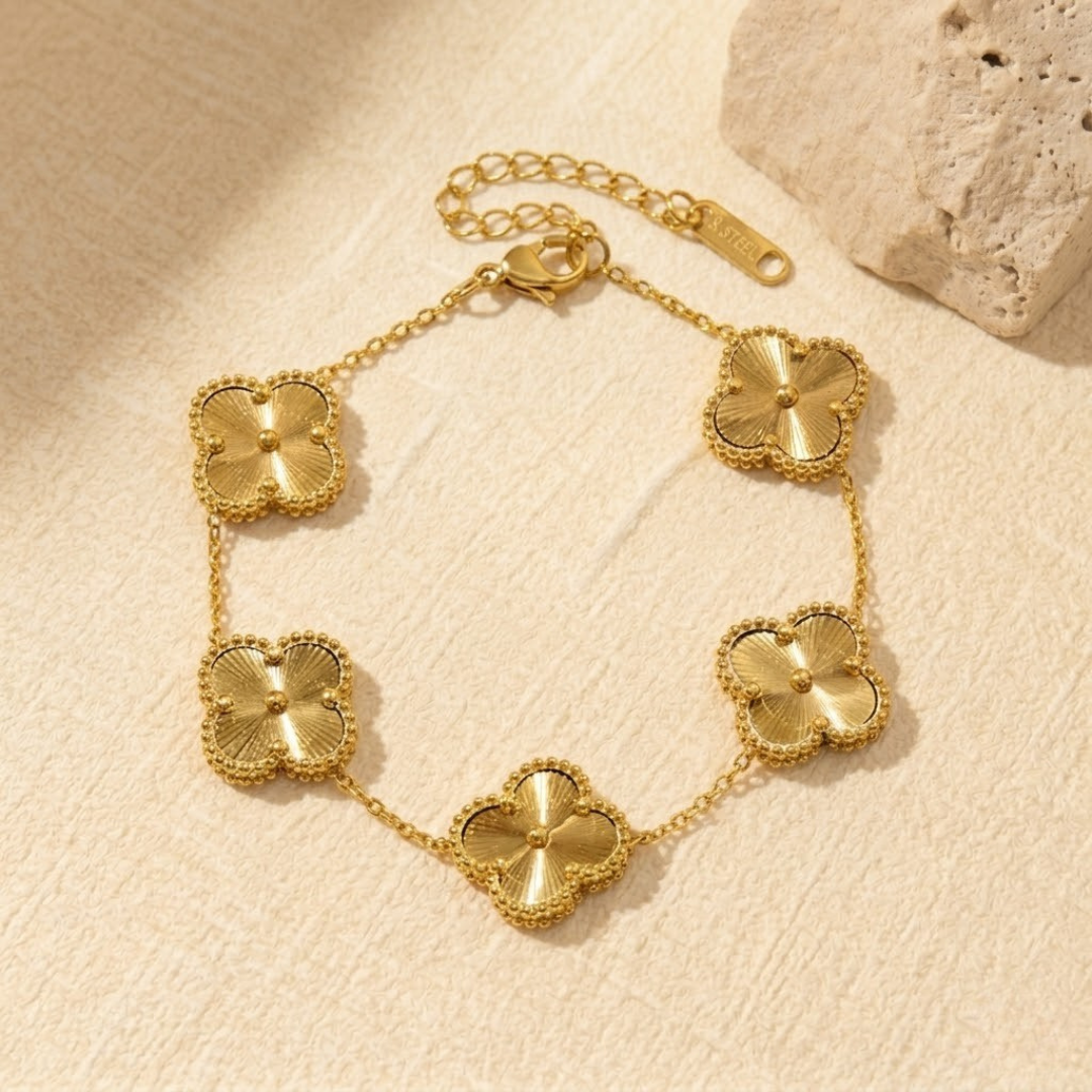 Five motif vintage gold clover bracelet with etched sunburst design