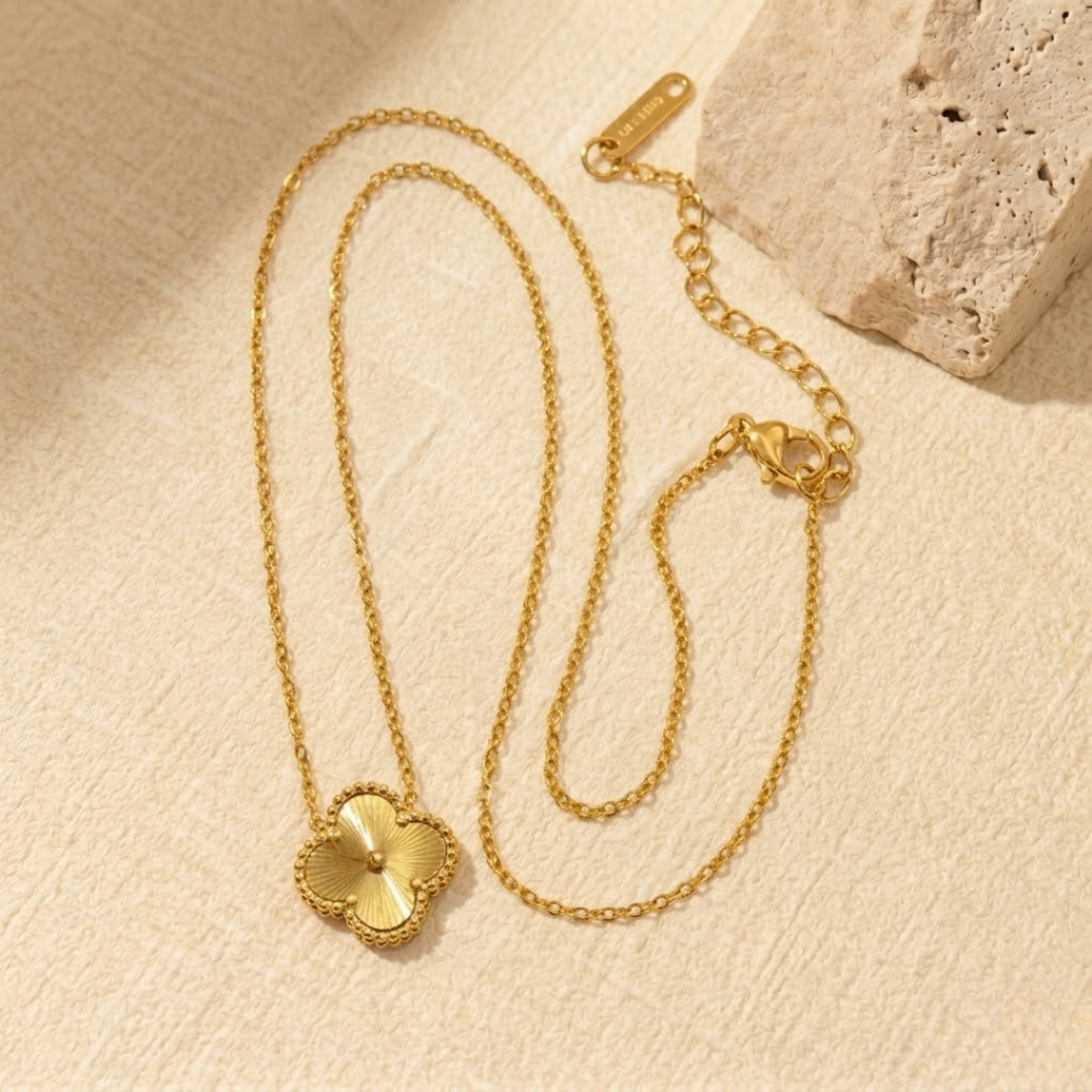 Luxury vintage gold clover pendant necklace on a delicate adjustable chain