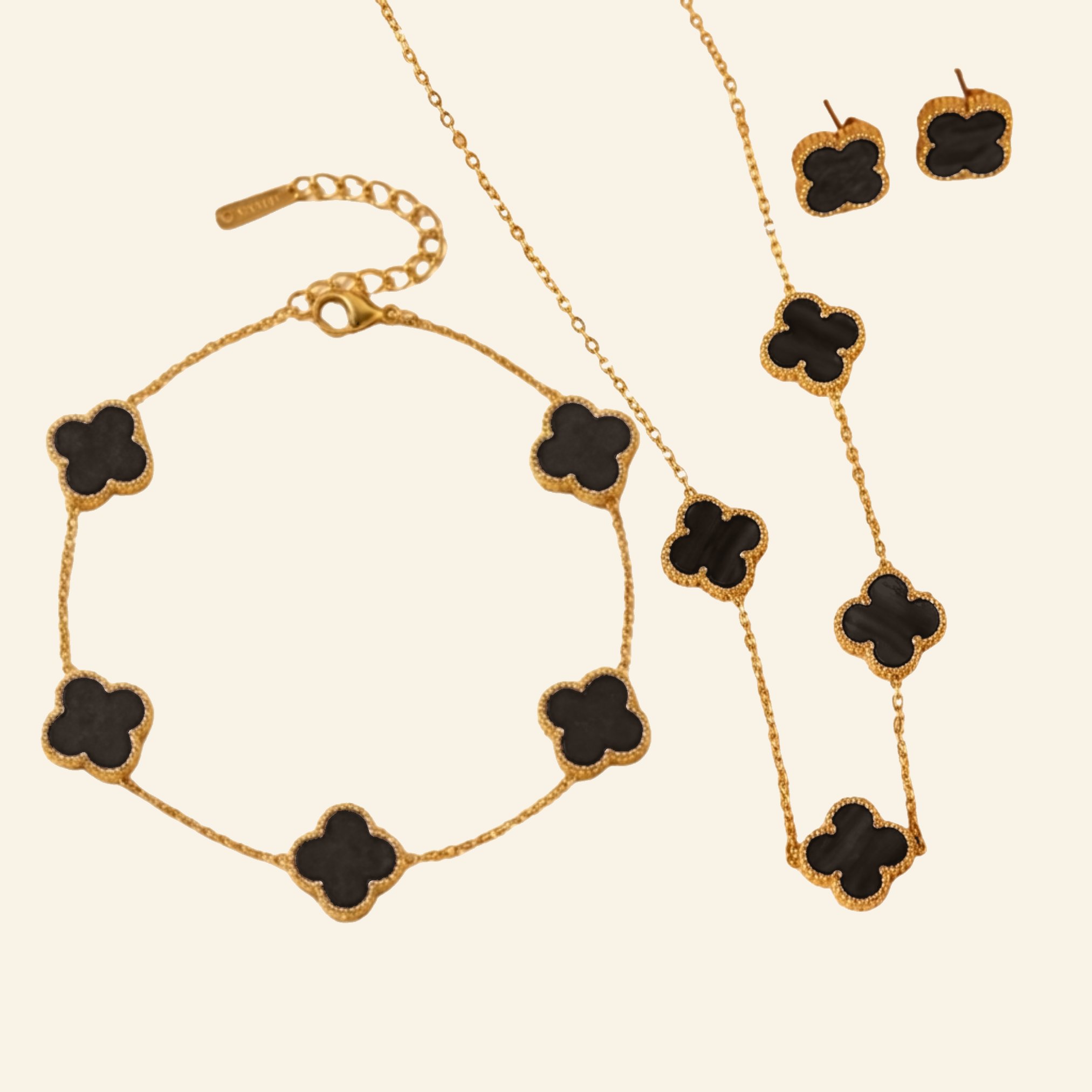 Black clover jewellery set in 18k gold plated finish