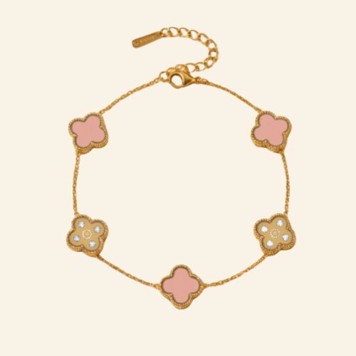 Pink and gold two tone clover bracelet with cubic zirconia