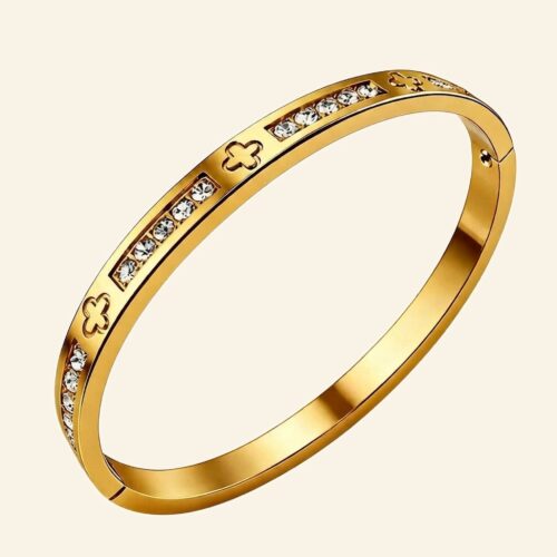 Gold crystal clover bangle with clover cut-outs and channel-set crystals