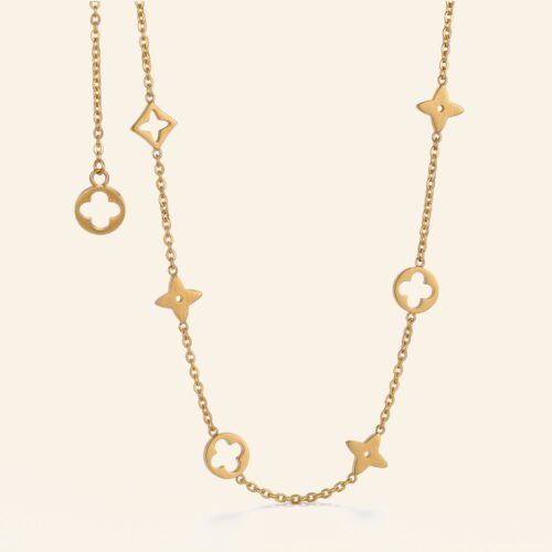 Gold clover charm necklace with open four-leaf clovers and star charms