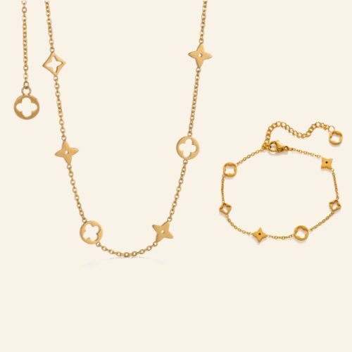Gold clover charm necklace and matching bracelet with open clover and star charms
