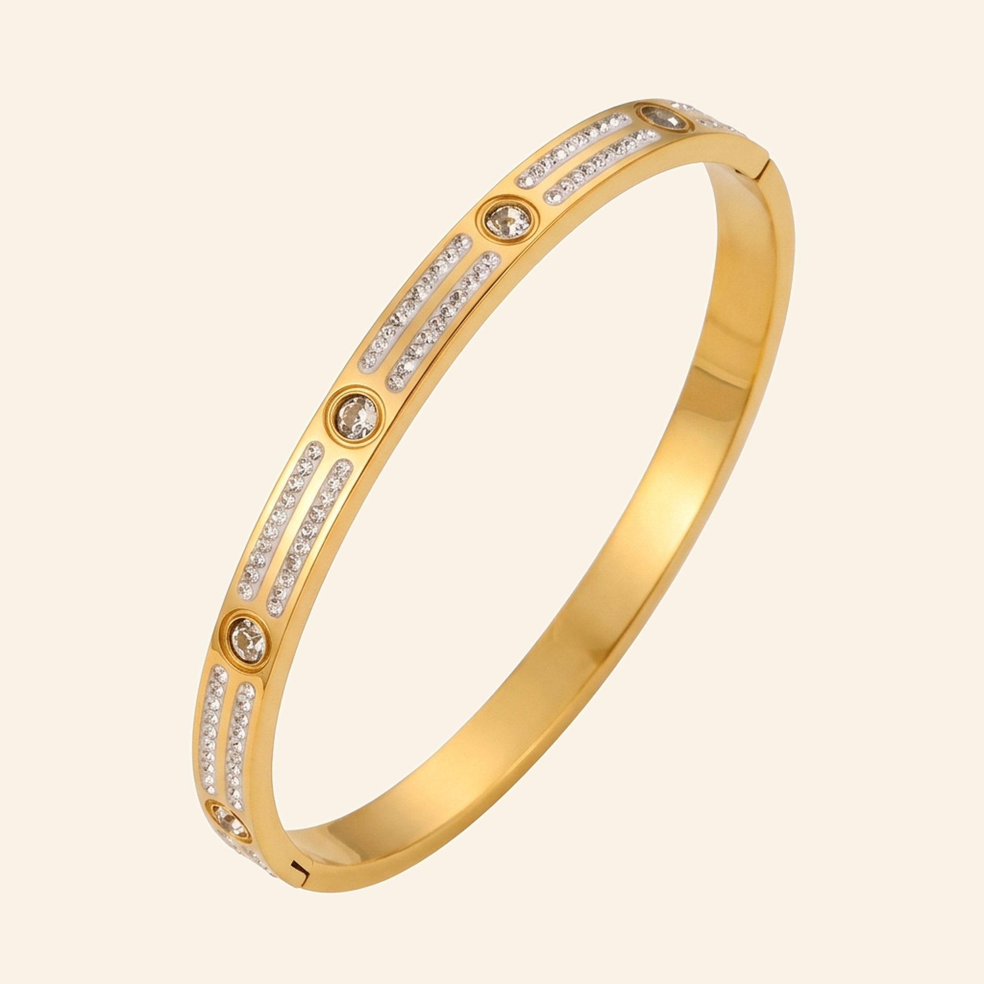 Gold bangle with two rows of small crystals and round bezel-set stones