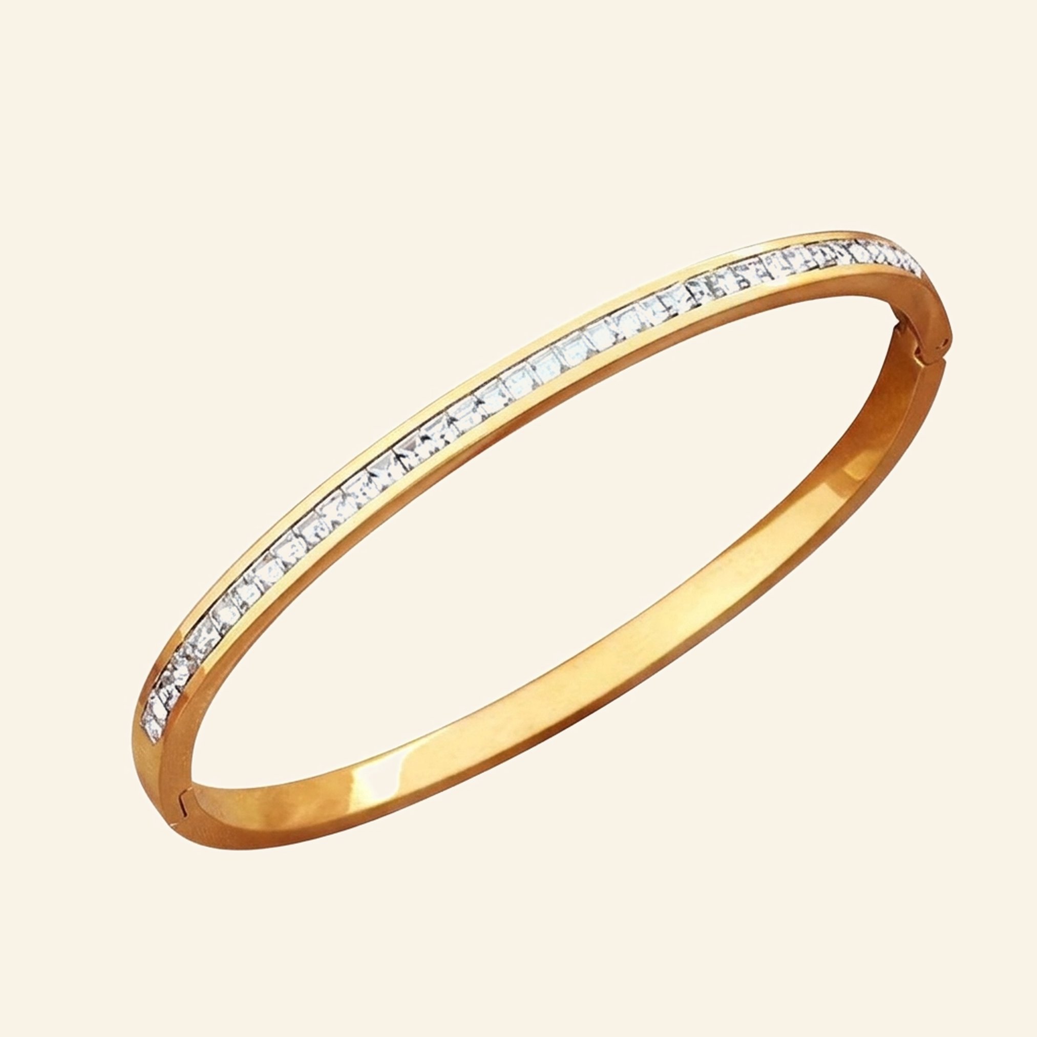 Gold eternity bangle with baguette crystals set along the full top of the band