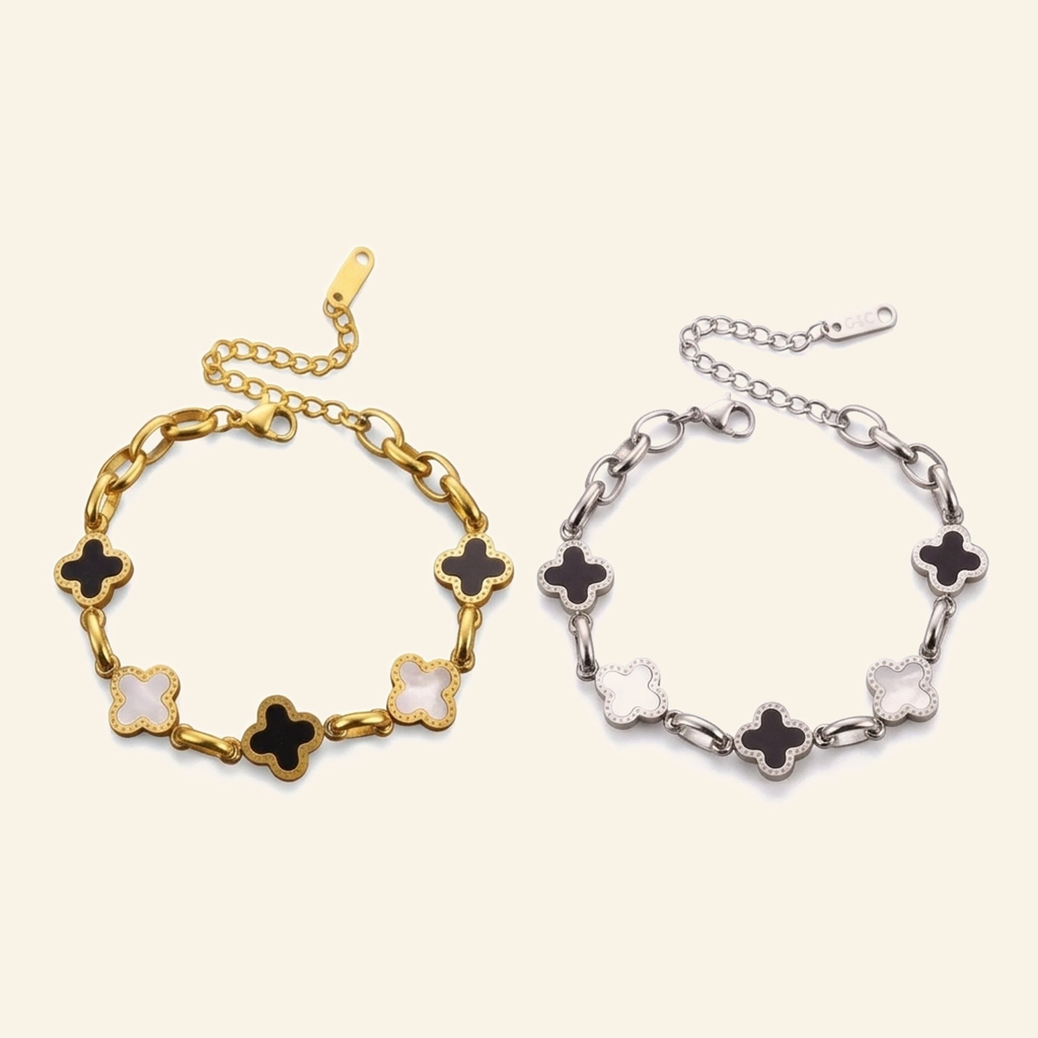 Gold and silver black and white clover bracelets shown side by side