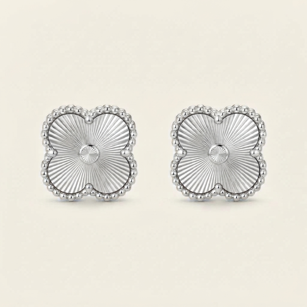 Pair of silver textured four-leaf clover stud earrings