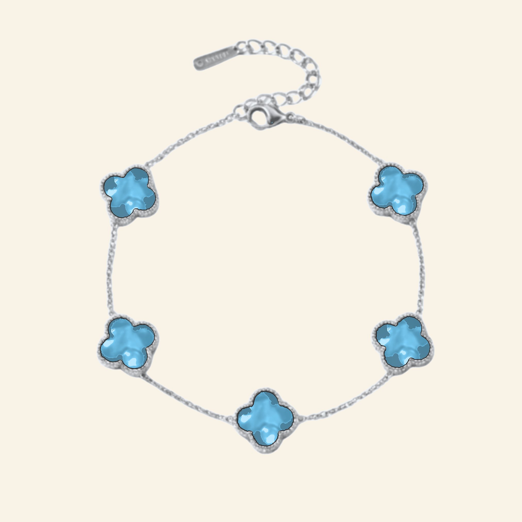 Silver clover bracelet with turquoise blue petals on a fine chain