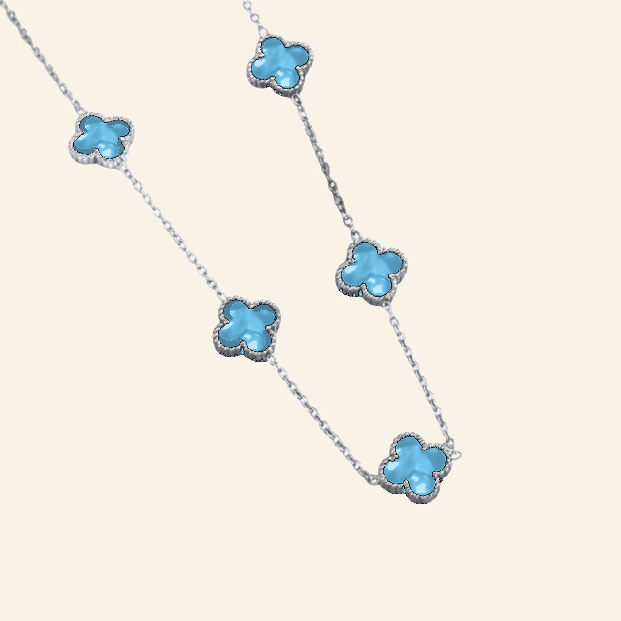 Silver plated necklace with turquoise blue clover stations